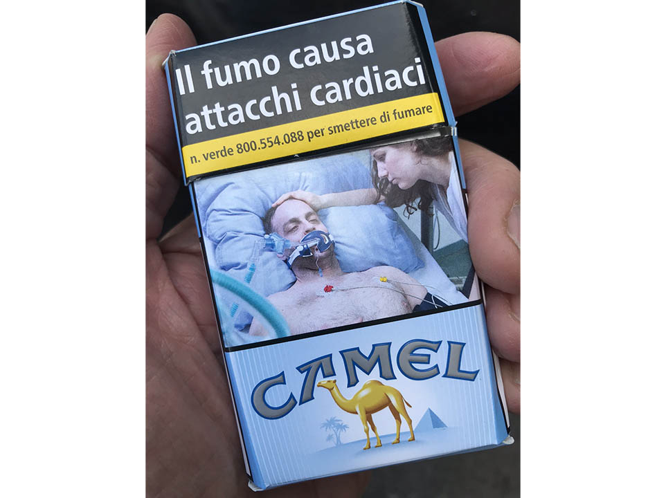 These are actual photos of packs of cigarettes as they are sold in Italy, with gory photos illustrating consequences of smoking as well as giving a phone number for assistance in quitting.