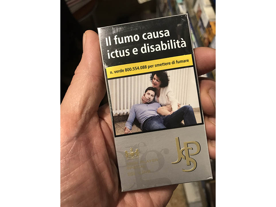 These are actual photos of packs of cigarettes as they are sold in Italy, with gory photos illustrating consequences of smoking as well as giving a phone number for assistance in quitting.